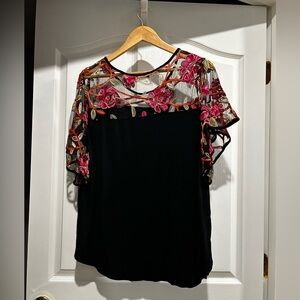 Lot of four  Women’s summer/spring tops - all size large.